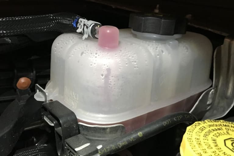 coolant coming out of overflow